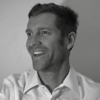 a man, called Jason Albert, in a white shirt