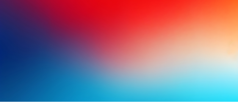 A soft, blurred mix of red, blue, and white hues in the background
