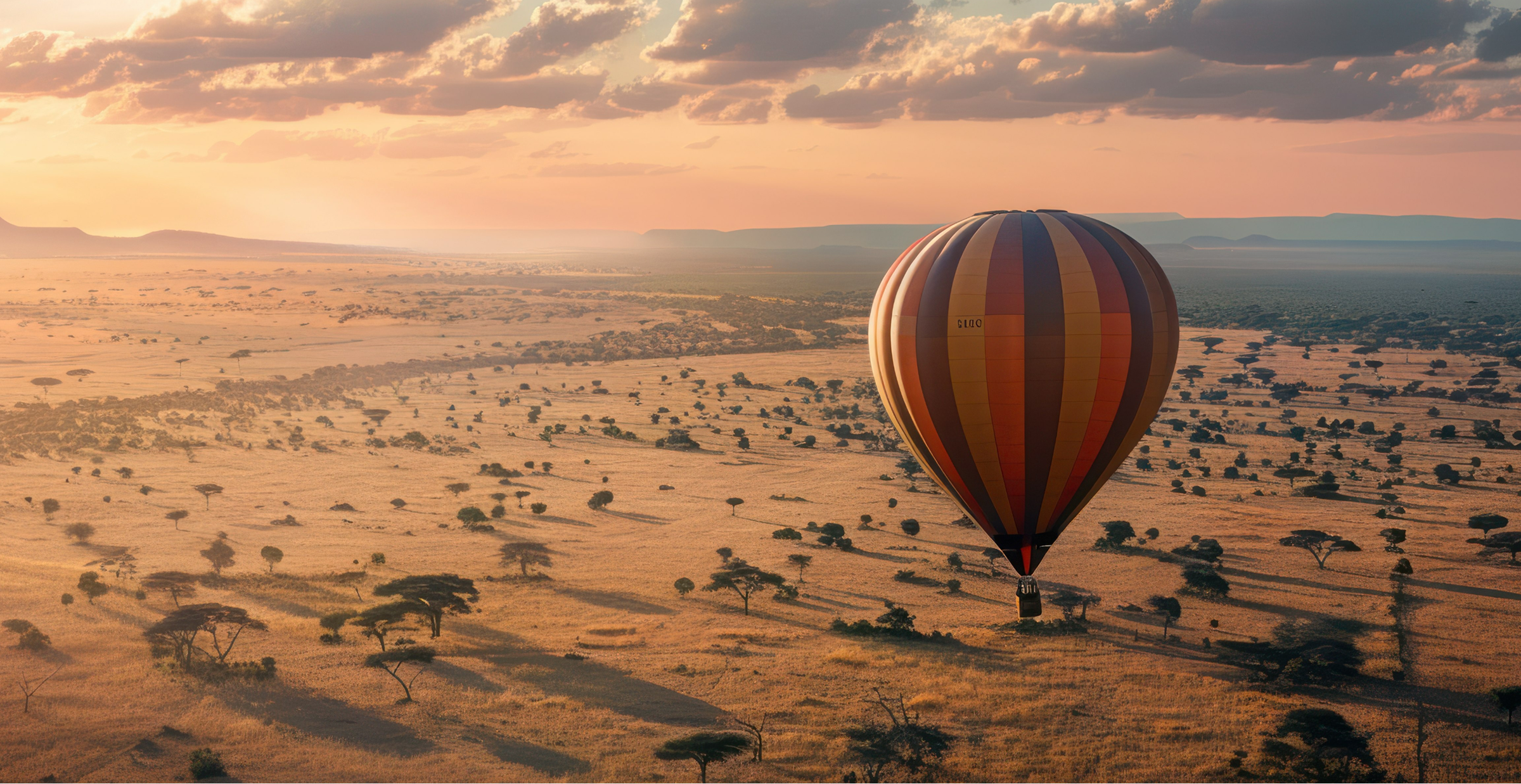 A hot air balloon with red and black stripes floats above the vast African savanna at sunset, casting long shadows over scattered acacia trees and golden grasslands.