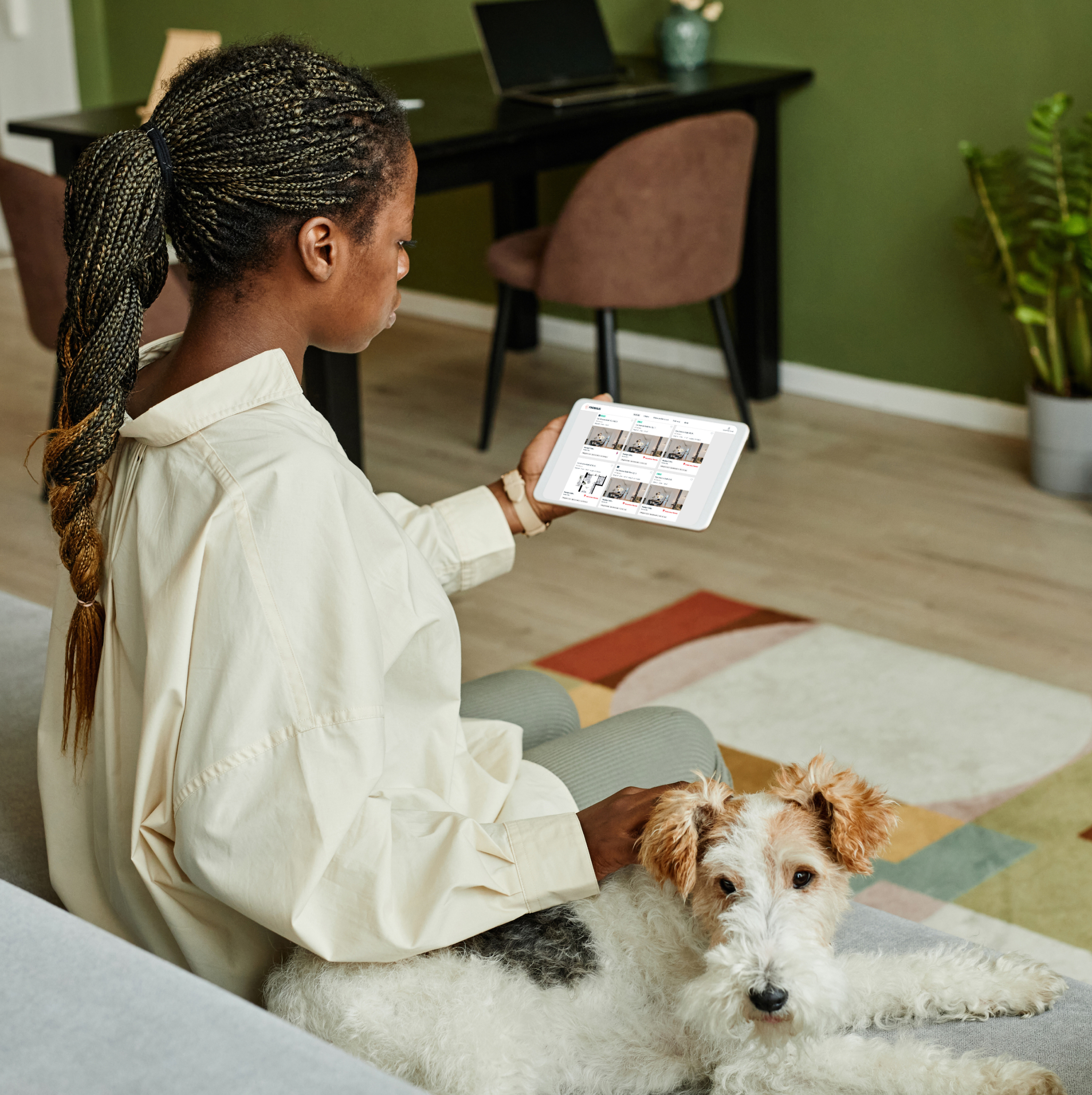  A woman sitting on a couch with a dog