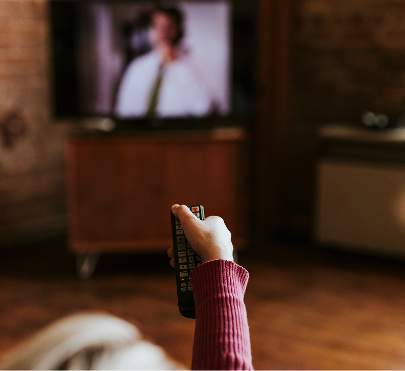 People use remote for the TV to change show inside of house