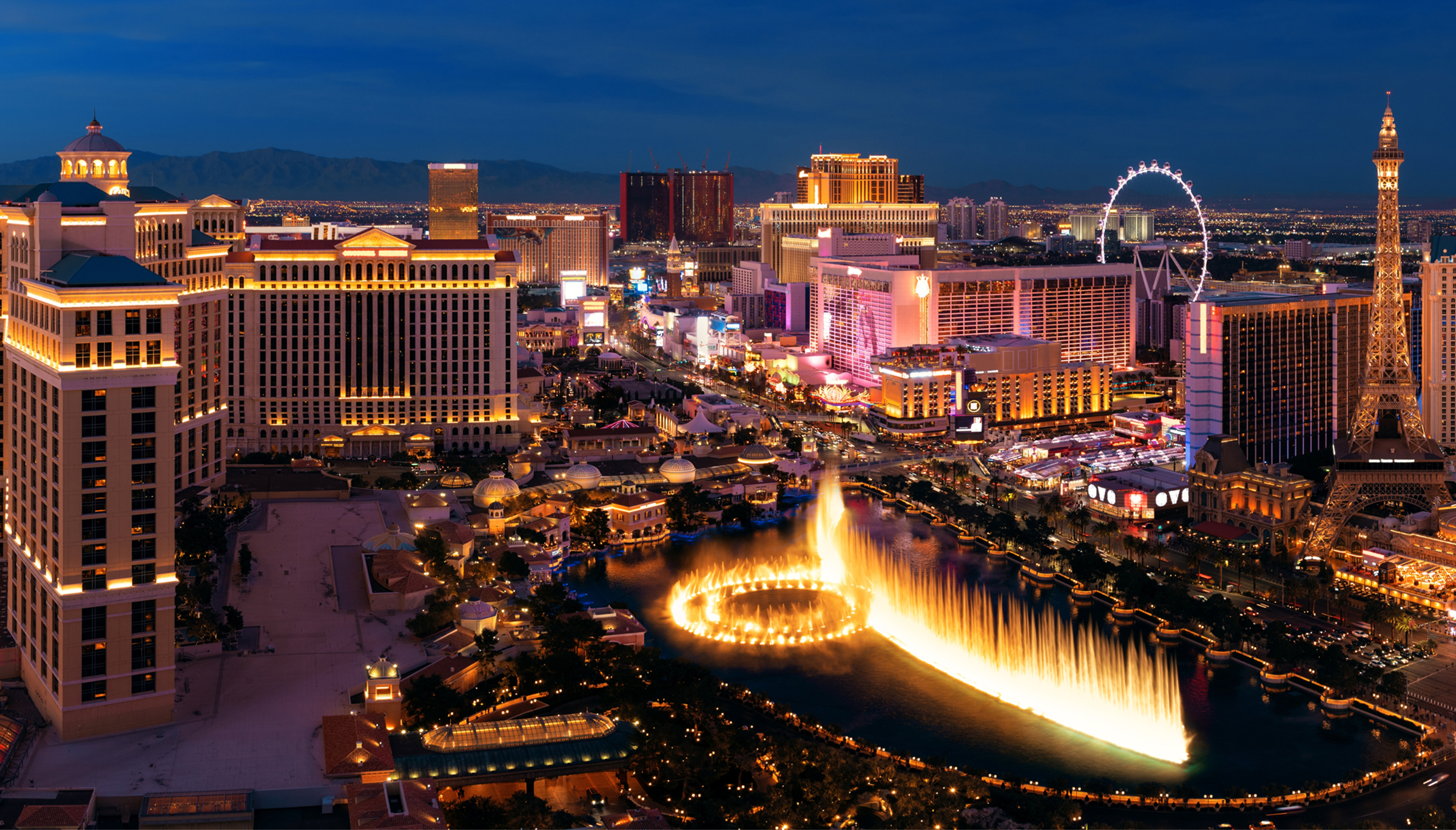 Las Vegas skyline featuring various hotels and resorts, showcasing vibrant lights and architectural diversity.